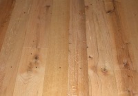 red Oak flooring, remilled from log house and barn timbers.