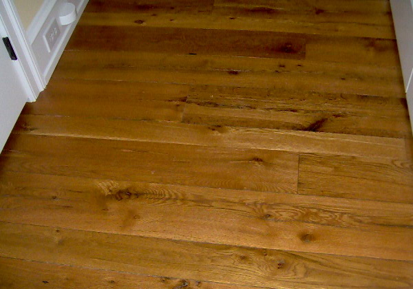 White Oak flooring, remilled from log house and barn timbers.